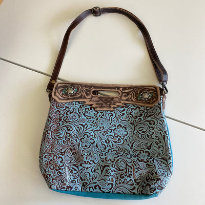 It's Tooled Leather Ya'll by Myra