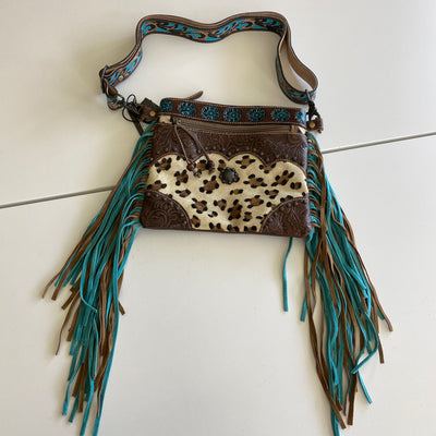 It's Tooled Leather Ya'll by Myra