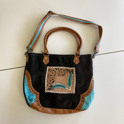 It's Tooled Leather Ya'll by Myra