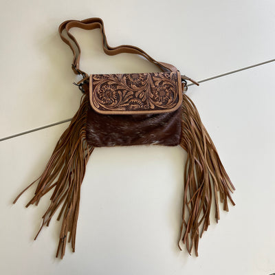 It's Tooled Leather Ya'll by Myra