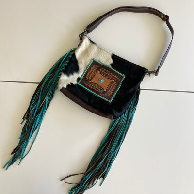 It's Tooled Leather Ya'll by Myra