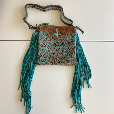 It's Tooled Leather Ya'll by Myra