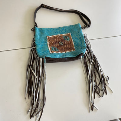 It's Tooled Leather Ya'll by Myra
