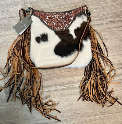 It's Tooled Leather Ya'll by Myra
